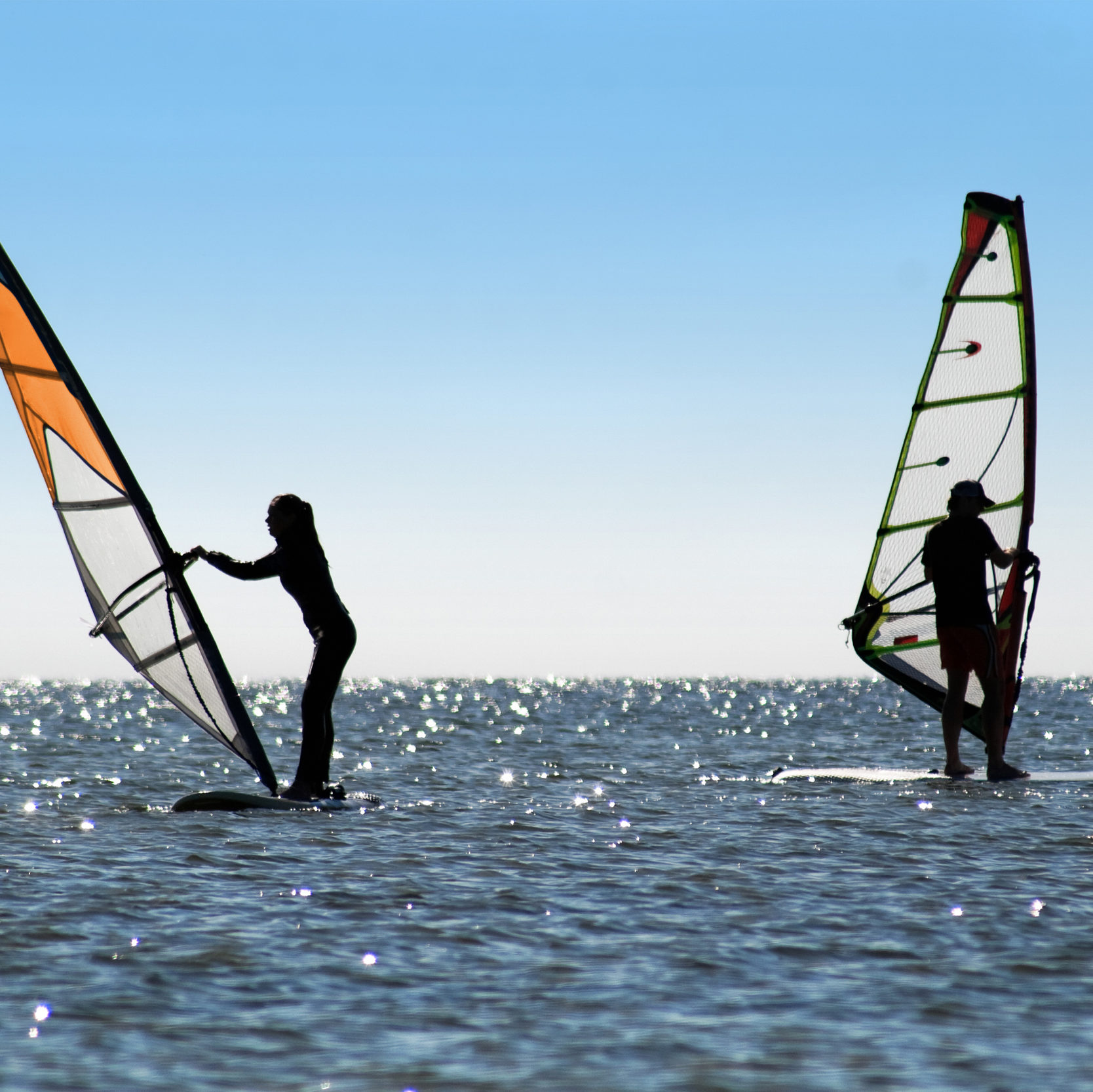 Complete the exchanges he is on windsurfing